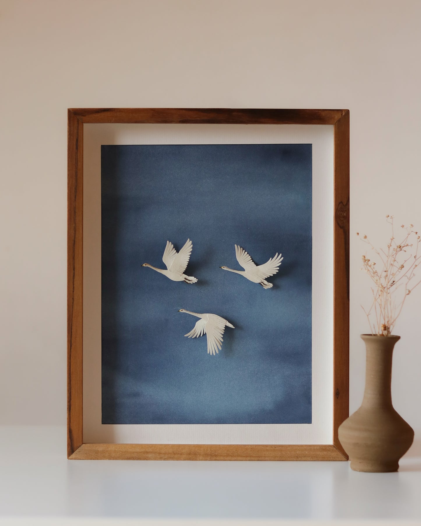 Whooper swans in Indigo Sky